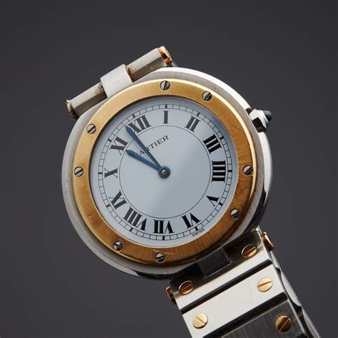 santos de cartier quartz round